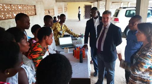 Some beneficiaries briefing the delegation including Mr. Christian Tardif, Ms Anne-Claire Dufay and Mr. Niyi Ojuolape 